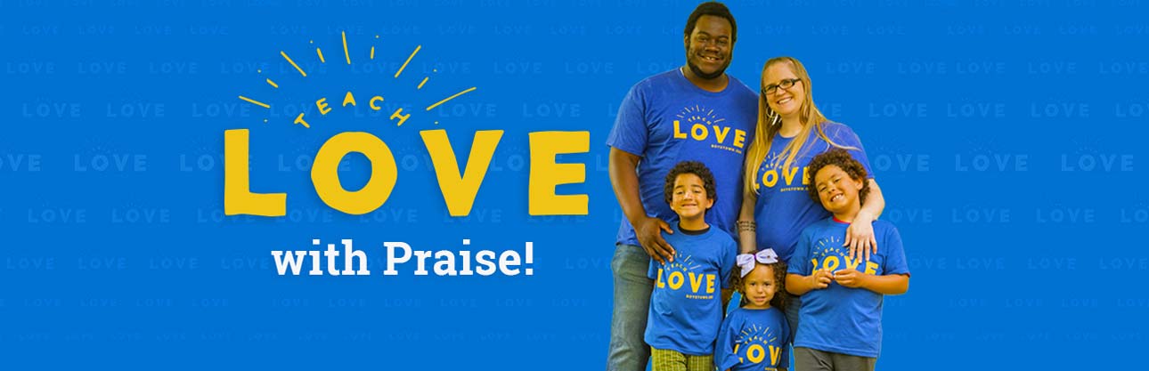 Parents and kids wearing teach love t-shirts