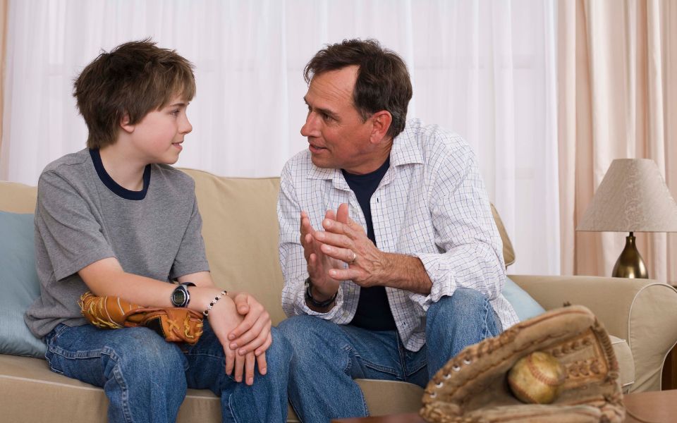 father and son talking
