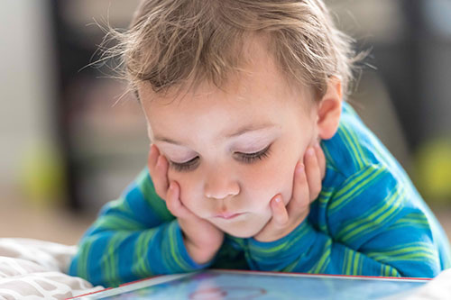 Toddler with iPad