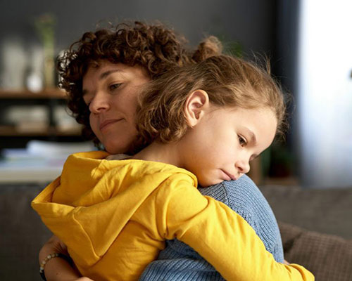 parent comforting child