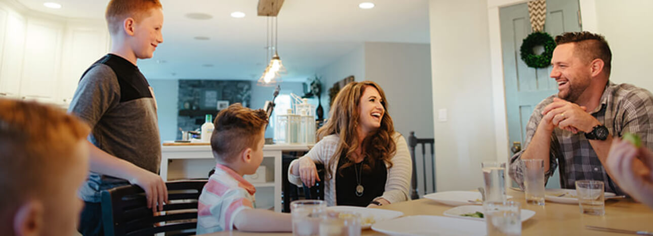 family talking at the dinner table