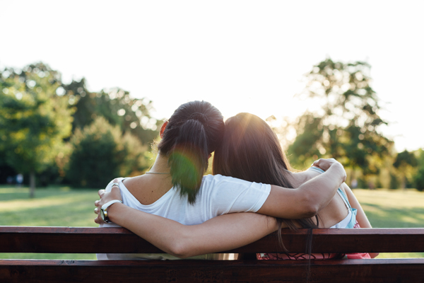 Two people hugging