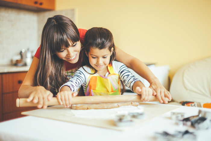 Mom and daughter baking