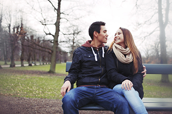 couple sitting on a bench