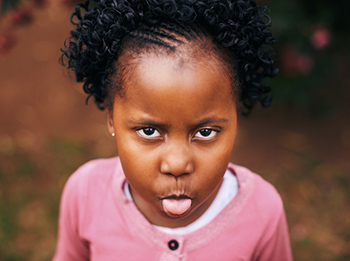 Girl sticking her tongue out