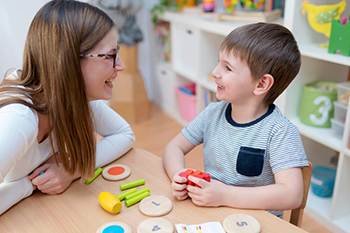 Mom and son playing