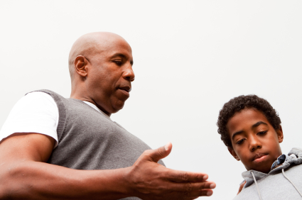 Dad disciplining child